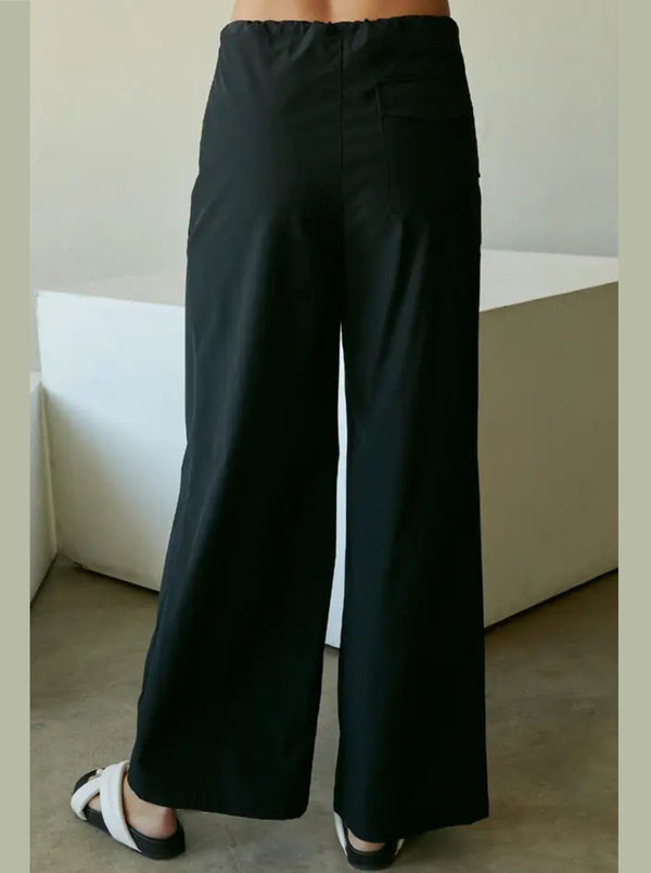 crescent kendra parachute pants, draw cord waist, wide leg, flap pockets, black